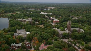 AX152_180 - 5.5K aerial stock footage orbiting Green Hall, autumn, Wellesley College, Massachusetts