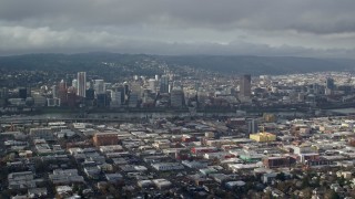 5.5K aerial stock footage of Downtown Portland from the east on a cloudy day, Portland, Oregon Aerial Stock Footage | AX153_020E