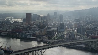 AX153_026E - 5.5K aerial stock footage flying along Willamette River looking toward Downtown Portland, Oregon