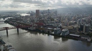 5.5K aerial stock footage flying over Willamette River toward Downtown Portland, Oregon Aerial Stock Footage | AX153_029E