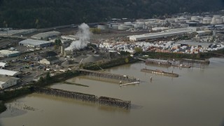 5.5K aerial stock footage tracking a manufacturing plant and rising steam, Northwest Portland, Oregon Aerial Stock Footage | AX153_062