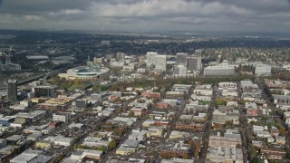 5.5K aerial stock footage passing the Oregon Convention Center and office buildings in Lloyd District, Portland, Oregon Aerial Stock Footage | AX153_101E