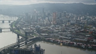 5.5K aerial stock footage of bridges spanning the Willamette River and skyscrapers in Downtown Portland, Oregon Aerial Stock Footage | AX153_114E