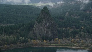 5.5K aerial stock footage flying by Beacon Rock in Columbia River Gorge, Skamania County, Washington Aerial Stock Footage | AX154_026E