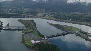 5.5K aerial stock footage orbiting the Bonneville Dam in the Columbia River Gorge Aerial Stock Footage | AX154_034E