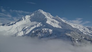 5.5K aerial stock footage of snow-covered Mount Hood, Cascade Range, Oregon Aerial Stock Footage | AX154_078E