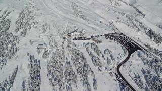 5.5K aerial stock footage of Timberline Lodge on the snowy slopes of Mount Hood, Cascade Range, Oregon Aerial Stock Footage | AX154_095