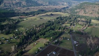 5.5K aerial stock footage flying over farms in Parkdale, Oregon Aerial Stock Footage | AX154_141E