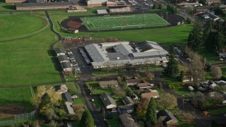 5.5K aerial stock footage orbiting Gause Elementary and the Washougal High School football and baseball fields in Washougal, Washington Aerial Stock Footage | AX154_205