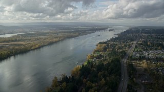 5.5K aerial stock footage following Highway 14 and the Columbia River toward the I-205 Bridge in Vancouver, Washington Aerial Stock Footage | AX154_215E