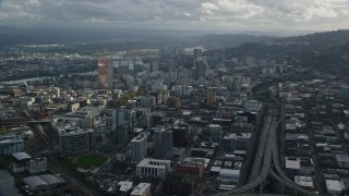 5.5K aerial stock footage of skyscrapers and Interstate 405 in Downtown Portland, Oregon Aerial Stock Footage | AX154_228