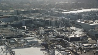 AX154_251E - 5.5K aerial stock footage approaching the Intel Ronler Acres Campus in Hillsboro, Oregon