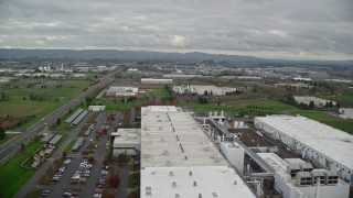 AX155_001 - 5.5K aerial stock footage flying over SolarWorld plant and approach Jireh Semiconductor, Hillsboro, Oregon