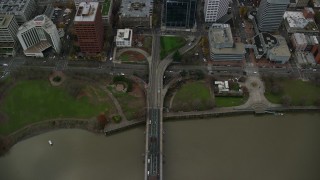 5.5K aerial stock footage of a bird's eye view of the Hawthorne Bridge becoming SW Madison Street and the waterfront park in Downtown Portland, Oregon Aerial Stock Footage | AX155_095E