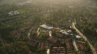 5.5K aerial stock footage flying by apartments and greenhouses in Southwest Portland, Oregon Aerial Stock Footage | AX155_120