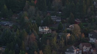 5.5K aerial stock footage flying by suburban homes on a cul-de-sac at twilight in Hillsboro, Oregon Aerial Stock Footage | AX155_135