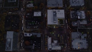 5.5K aerial stock footage of a bird's eye view follow SW 5th Avenue at twilight through Downtown Portland, Oregon Aerial Stock Footage | AX155_243E