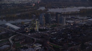 5.5K aerial stock footage of South Waterfront high-rise condo complexes by the Willamette River in Portland, Oregon, twilight Aerial Stock Footage | AX155_245