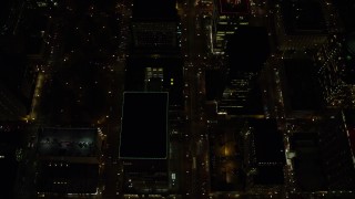 5.5K aerial stock footage of a bird's eye of SW 4th and SW 5th Avenue at night through Downtown Portland, Oregon, reveal US Bancorp Tower Aerial Stock Footage | AX155_336E