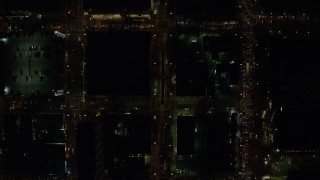 5.5K aerial stock footage of a bird's eye of heavy traffic through downtown at night, Downtown Portland, Oregon Aerial Stock Footage | AX155_342