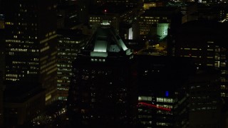 5.5K aerial stock footage of KOIN Center rooftop venting steam at night in Downtown Portland, Oregon Aerial Stock Footage | AX155_375E