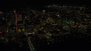 5.5K aerial stock footage approaching Downtown Portland from the Willamette River at night in Oregon Aerial Stock Footage | AX155_406E