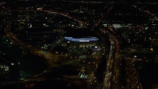 5.5K aerial stock footage following I-5 over interchange to approach Moda Center and convention Center at night in Northeast Portland, Oregon Aerial Stock Footage | AX155_420E