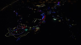 5.5K aerial stock footage approaching the Oregon Zoo with holiday lights at night, Southwest Portland, Oregon Aerial Stock Footage | AX155_438E