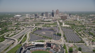 AX36_033E - 4.8K aerial stock footage flying over Turner Field toward the skyline of Downtown Atlanta, Georgia