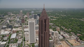 4.8K aerial stock footage flying by SunTrust Plaza to approach Bank of America Plaza, Midtown Atlanta Aerial Stock Footage | AX36_040E