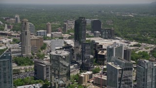 AX36_057E - 4.8K aerial stock footage of 3344 Peachtree and office high-rises, Buckhead, Georgia