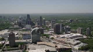 AX36_063E - 4.8K aerial stock footage flying by skyscrapers and office buildings, Buckhead, Georgia