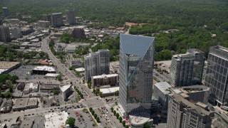 AX36_065E - 4.8K aerial stock footage approaching Terminus Atlanta and tilting down to a bird's eye shot, Buckhead, Georgia