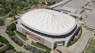 4.8K aerial stock footage tilting down on Georgia Dome, Downtown Atlanta Aerial Stock Footage | AX36_104