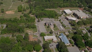 4.8K aerial stock footage approaching and tilting down on a church and parking lot, Atlanta, Georgia Aerial Stock Footage | AX37_001