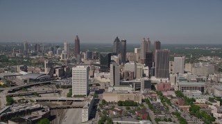 4.8K aerial stock footage approaching Downtown skyscrapers with Midtown Atlanta in the distance, Georgia Aerial Stock Footage | AX37_011E