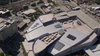 AX37_078 - 4.8K aerial stock footage approaching Georgia Aquarium, Atlanta, Georgia