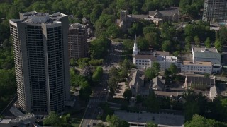 4.8K aerial stock footage approaching a church near condominium complexes, Buckhead, Georgia Aerial Stock Footage | AX38_010E