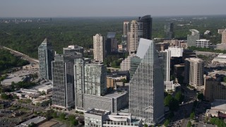 AX38_012E - 4.8K aerial stock footage approach skyscrapers and circle Terminus Atanta, Buckhead, Georgia