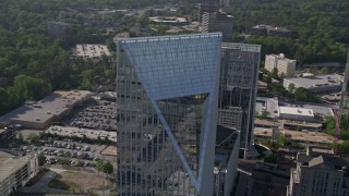 AX38_020 - 4.8K aerial stock footage orbiting away from Terminus Atlanta revealing sksycrapers, Buckhead, Georgia