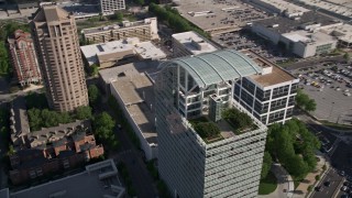 4.8K aerial stock footage approaching and tilting down on The Pinnacle skyscraper, Buckhead, Georgia Aerial Stock Footage | AX38_025