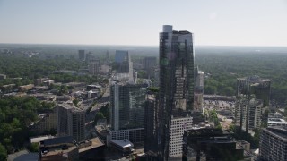 AX38_026 - 4.8K aerial stock footage flying by 3344 Peachtree skyscraper and approach Terminus Atlanta, Buckhead, Georgia