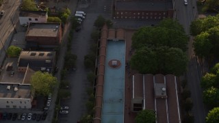 AX39_016 - 4.8K aerial stock footage tilting down and fly over Martin Luther King Jr. Memorial Fountain; Atlanta, Georgia