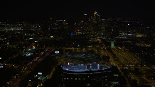 4.8K aerial stock footage approach and bird's eye of Turner Field, tilt to reveal Downtown Atlanta skyline, Atlanta, Georgia, night Aerial Stock Footage | AX41_005E