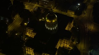 4.8K aerial stock footage approaching and tilting down on Georgia State Capitol, Downtown Atlanta, night Aerial Stock Footage | AX41_007