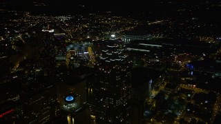 4.8K aerial stock footage orbiting SunTrust Plaza revealing nearby skyscrapers, Downtown Atlanta, night Aerial Stock Footage | AX41_017E