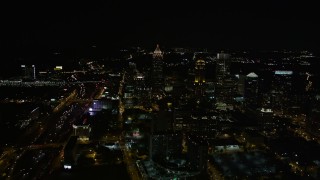 4.8K aerial stock footage tilting down on condominium complex, Midtown Atlanta, Georgia, night Aerial Stock Footage | AX41_027