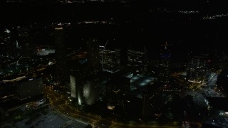 4.8K aerial stock footage flying by skyscrapers, Buckhead, Georgia, night Aerial Stock Footage | AX41_044