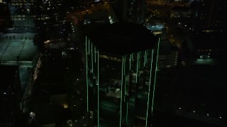 4.8K aerial stock footage flying away from 3340 Peachtree Road, Buckhead, Georgia, night Aerial Stock Footage | AX41_048