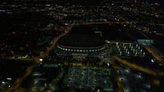 AX41_062E - 4.8K aerial stock footage approach and orbit Georgia Dome, Atlanta, Georgia, night